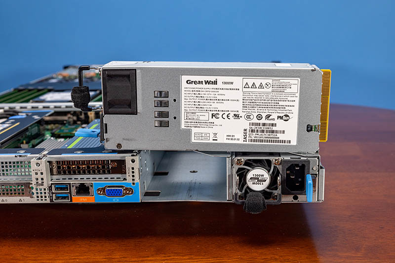 Inspur-NF5180M6-1.3kW-PSU-Cover-Server-Power-Deep-Dive.jpg Inspur-NF5180M6-1.3kW-PSU-Cover-Server-Power-Deep-Dive.jpg